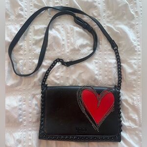 Victoria Secret purse. Black with red chained heart.